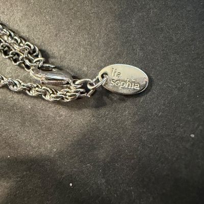 Lia Sophia marked silver tone tassel necklace