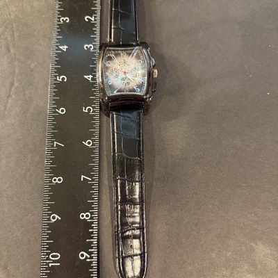 Charles Raymond quartz wristwatch with a black leather strap