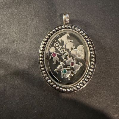 Silver tone necklace pendant