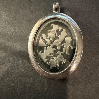 Silver tone necklace pendant