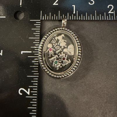 Silver tone necklace pendant