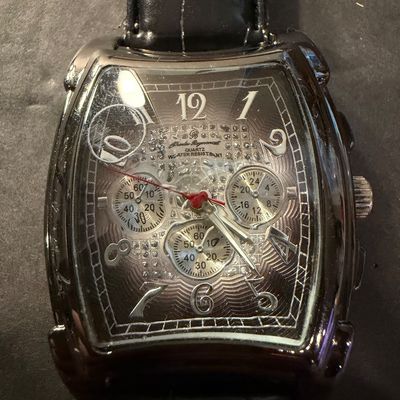 Charles Raymond quartz wristwatch with a black leather strap
