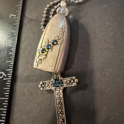 Vintage silver tone cross with blue rhinestone necklace