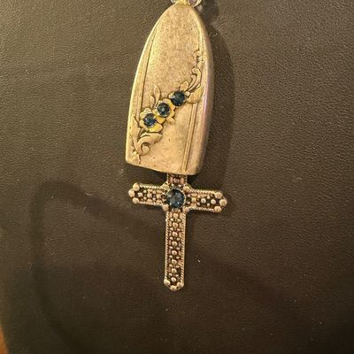 Vintage silver tone cross with blue rhinestone necklace