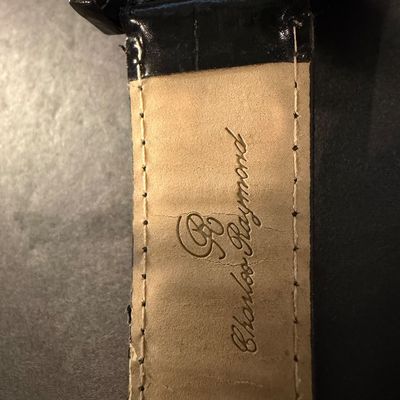 Charles Raymond quartz wristwatch with a black leather strap