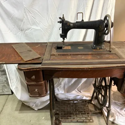 Treadle Sewing Machine With Wood Cabinet and Iron Base