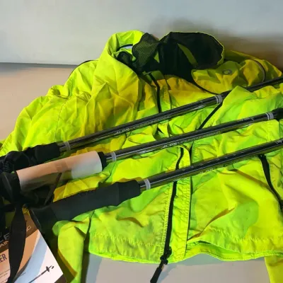 ALPS Mountaineering Explorer Trekking Poles and Yellow Jacket