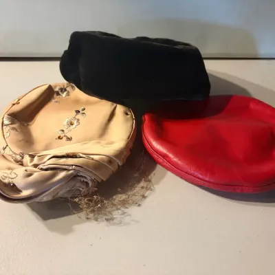 Three Vintage Hats in Silk, Leather, and Velvet