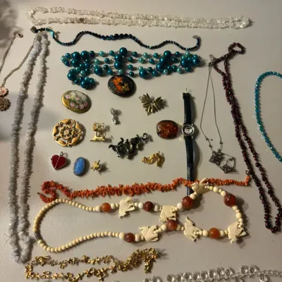 Jewelry Lot With Necklaces, Brooches, and Watch
