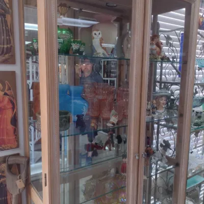 Sale Photo Thumbnail #214: Large Glass Curio Cabinet with Wrought Metal Scroll Accents (#29)