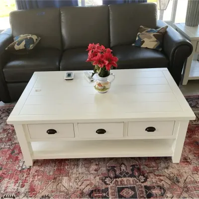 White Wooden Coffee Table With Three Drawers On Each Side
