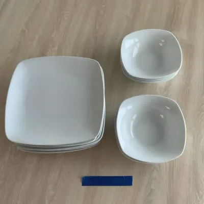 Eight Piece White. Ceramic Dinnerware Set