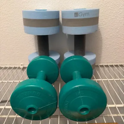 One Set Of Water Dumbbells, One Set Of 5 Pound Plastic Dumbbells
