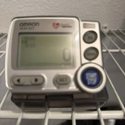 Omron Blood Pressure Cuff With Intelligence. Power Is On And Works.