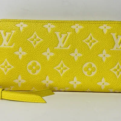 Authenticated Louis Vuitton Yellow Monogram Empreinte Zippy Wallet