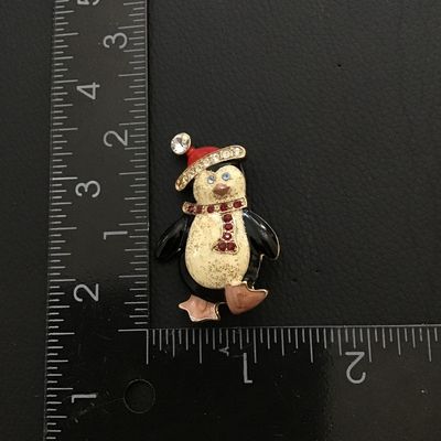 Cute enamel holiday penguin brooch