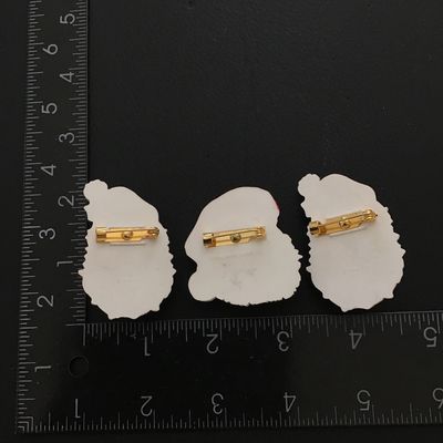 Lot of vintage Santa Claus brooches