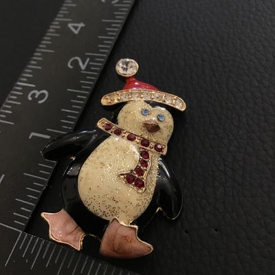 Cute enamel holiday penguin brooch