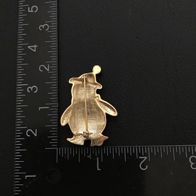 Cute enamel holiday penguin brooch