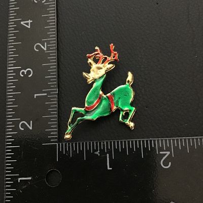Cute enamel reindeer holiday brooch