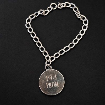 Sale Photo Thumbnail #140: J 1964 prom sterling silver charm bracelet 6g