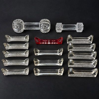 Sale Photo Thumbnail #83: Hd assorted lot of 17 clear and red knife rests