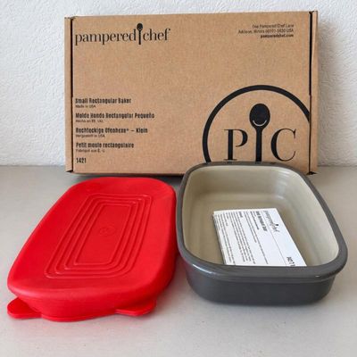 Sale Photo Thumbnail #201: Lk pampered chef small rectangular baker with red silicone lid