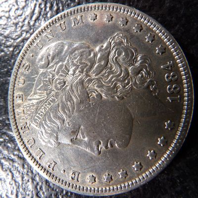 1884 MORGAN SILVER DOLLAR