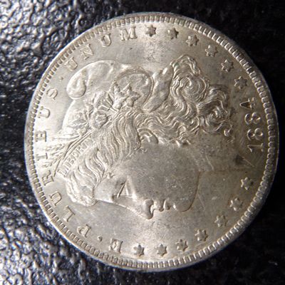 1884 MORGAN SILVER DOLLAR