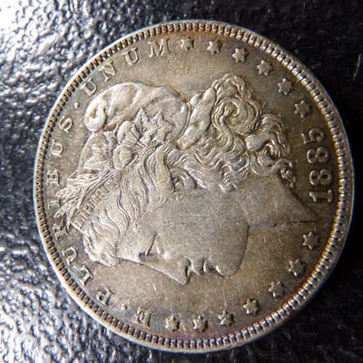 1885 MORGAN SILVER DOLLAR