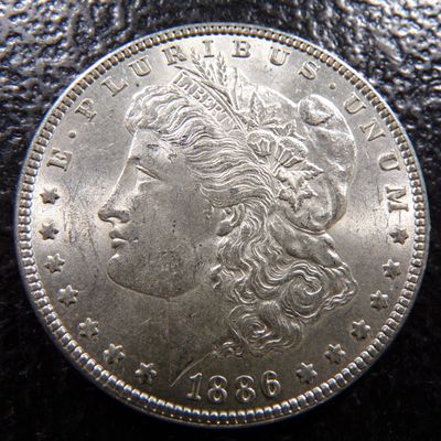 1886 MORGAN SILVER DOLLAR