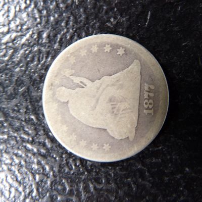 1877 SEATED LIBERTY SILVER QUARTER