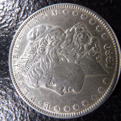 1889 MORGAN SILVER DOLLAR