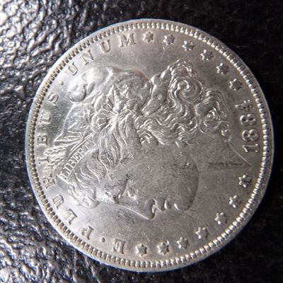 1884 MORGAN SILVER DOLLAR