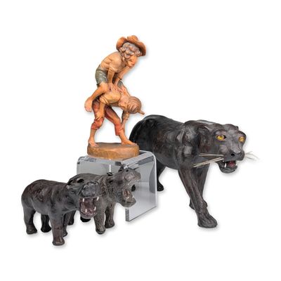 Sale Photo Thumbnail #412: Collection of Four Carved Wood and Leather Figurines