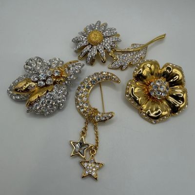 Gold Tone Nolan Miller Rhinestone Designer Brooches Flower Moon AB28