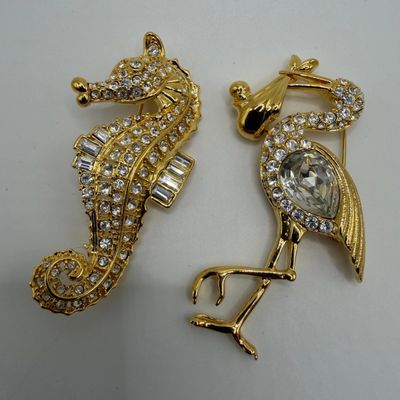 Seahorse and Flamingo Pair of Nolan Miller Clear Rhinestone Animal Brooches