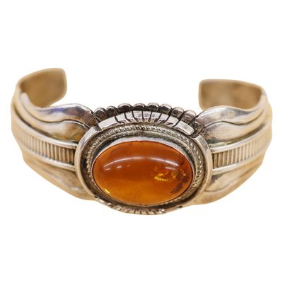 Sale Photo Thumbnail #85: Wes Craig Navajo Sterling Amber Cabochon Cuff
