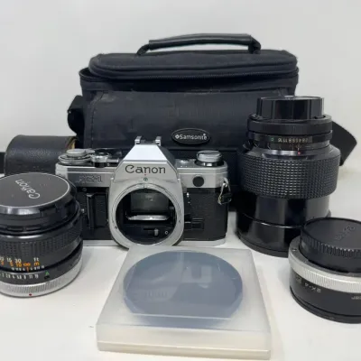 Canon AE-1 35mm SLR Camera Outfit w/ 2 Lenses, 2X Converter, Samsonite Bag