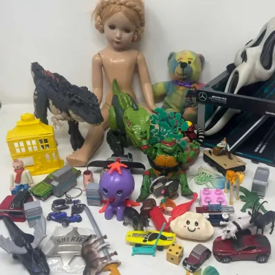 Mixed Toy Lot: TMNT Figure, Dinosaurs, Die-Cast Cars, Doll, F1 Display + More