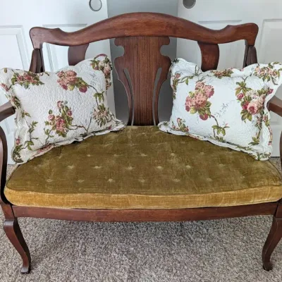 Antique Wooden Settee In A Carved Mahogany Frame