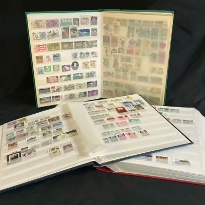  Three 9 x 12 Stamp Albums with Large Worldwide and U.S. Stamp Collection