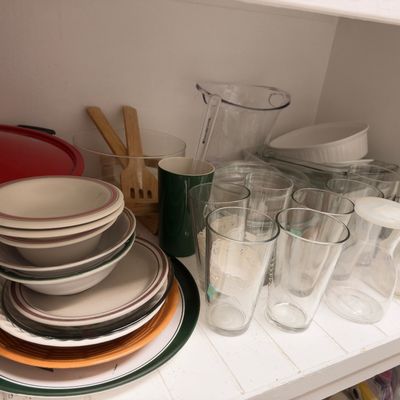 Stoneware dishes, glass tumblers and pitcher