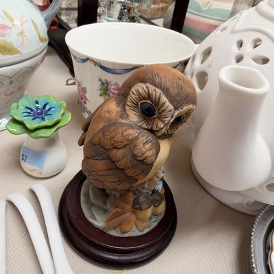 Porcelain barn owl figurine on wood base