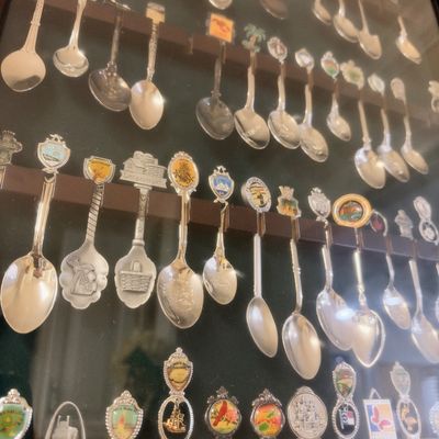 Collector souvenir spoons, enamel crests