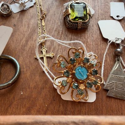 Blue stone flower brooch, cross pendant, green stone ring