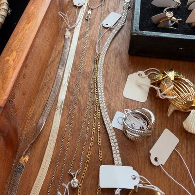 Herringbone chain necklaces, rhinestone bracelet, gold tone brooch