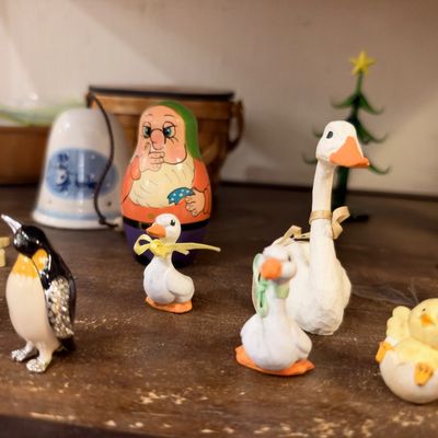 Porcelain goose, duck and penguin figurines