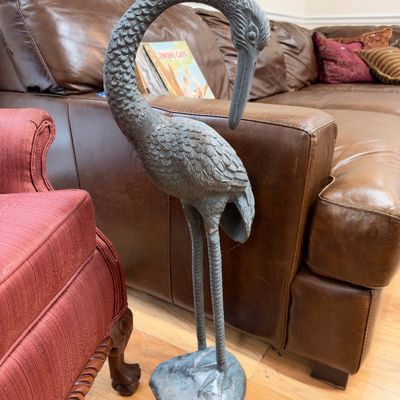 Metal heron garden statue