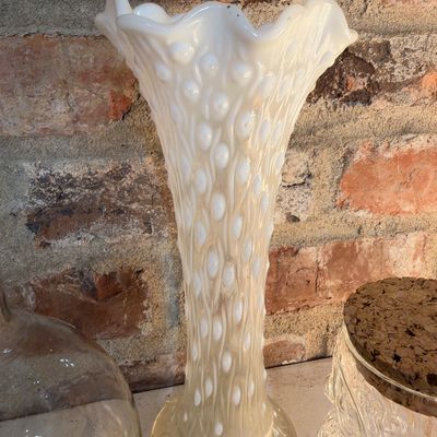 Tall white milk glass swung vase